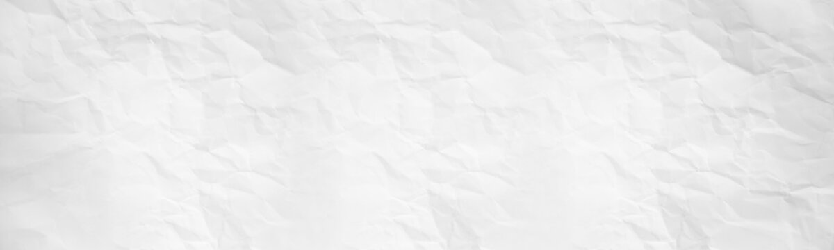 wide panorama crumpled paper texture background. crush paper so that it becomes creased and wrinkled.