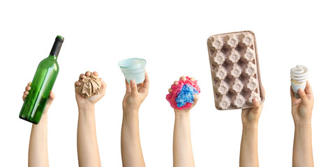 Recyclable rubbish held in hands isolated on white background