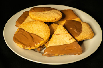 Delicious shortbread cookies with a chocolate drizzle.