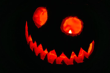 Fototapeta premium Carving the pumpkin is always the best part of Halloween.