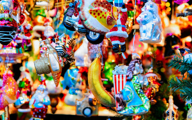 Christmas Decoration at Christmas Market at Gendarmenmarkt square, Winter Berlin, Germany. German Night street Xmas and holiday fair in European city or town, December. Berlin in Gendarmenmarkt bazaar