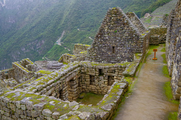 View of Machu Picchu Machupicchu ruins lost Inca city and UNESCO world heritage site in the Peruvian Andes with magical and mysterious Atmosphere with clouds, fog and mist