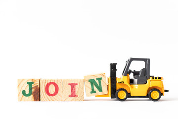 Toy forklift hold wood letter block n to complete word join on white background