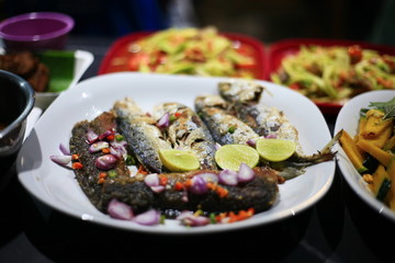 Dried sea fish with chips