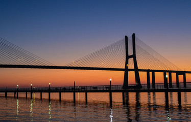 Fototapeta na wymiar Vasco da Gama Bridge Silhouette at Dawn