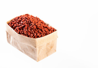 Bixa Orellana - Organic achiote seeds in paper bag