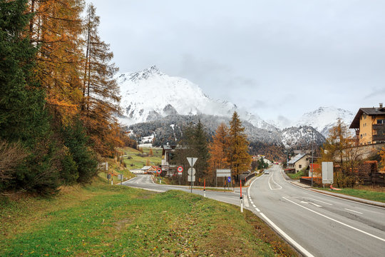 View of the alpine village of Nauders and snow-capped Alps in autumn. District of Landeck in the Austrian state of Tyrol, Europe.