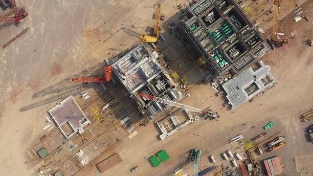 Overhead Drone Shot Of Oil Drilling Platforms Under Construction At Shipyard In Qingdao, Offshore Oil And Gas Exploration Activities In South China Sea And Elsewhere