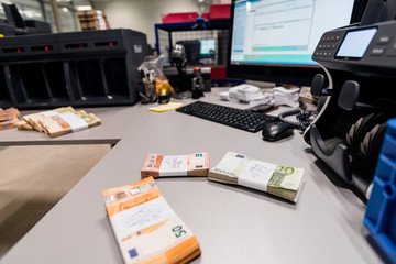 Stacks of euro € banknotes with bill bands