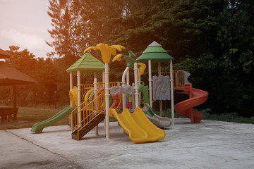 Colorful playground equipment for children in public park.in Thailand.