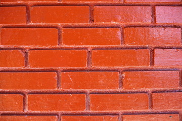 Brick wall painted with orange