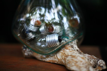 The old light bulb in a glass jar