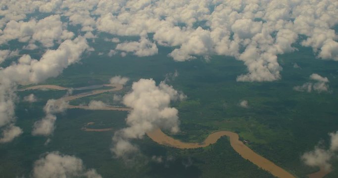 Flying Over Impassable Jungles of Borneo Island near Mulu River in Gunung Mulu National Park, Sarawak Province, Malaysia