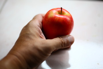 Fresh apples on the wood floor