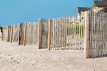 Wooden fence on a beach