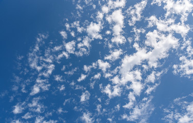 Blue sky and clean white clouds as a nature background
