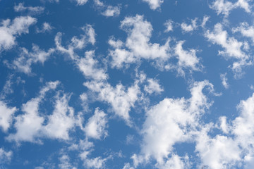 Blue sky and clean white clouds as a nature background