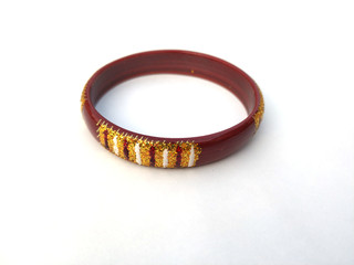 indian traditional bangles isolated on violet background