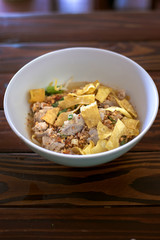 Spicy Pork spare ribs noodles with Crispy Sweet topped with grind peanut