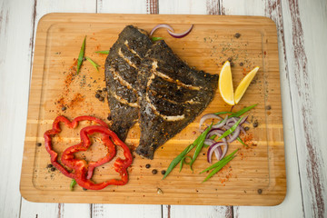 fried flounder with spices and vegetables. Grill. Fish. - 302362302