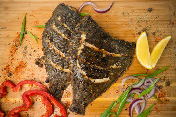fried flounder with spices and vegetables. Grill. Fish. - 302362303