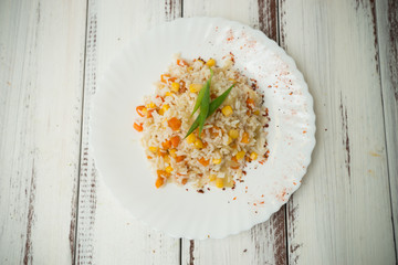 boiled rice with carrots and corn - 302362363