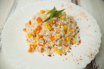boiled rice with carrots and corn - 302362374