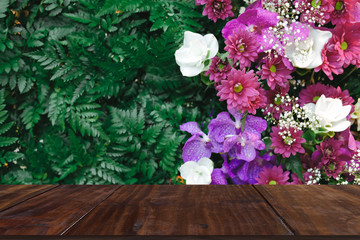 purple flower green leaves decorating on wall