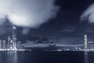 Panorama of Skyline and harbor of Hong Kong city at dusk