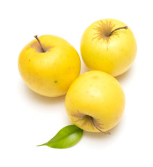 Yellow ripe apple isolated on a white background.