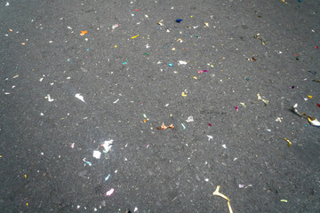 shiny foil paper debris on street