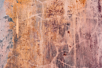Texture of a concrete wall with cracks and scratches which can be used as a background