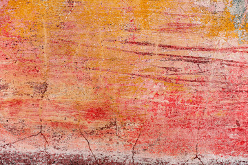 Texture of a concrete wall with cracks and scratches which can be used as a background