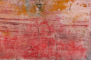 Texture of a concrete wall with cracks and scratches which can be used as a background