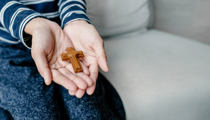 Close up prayer's hand pray in church, Pray to God with cross, with blank copy space © Win