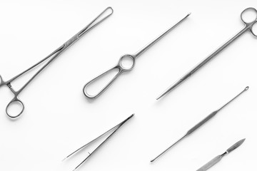 Instruments for plastic surgery on white background top view flat lay pattern
