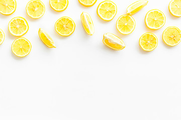 Lemon frame. Sliced citruses on white background top view space for text