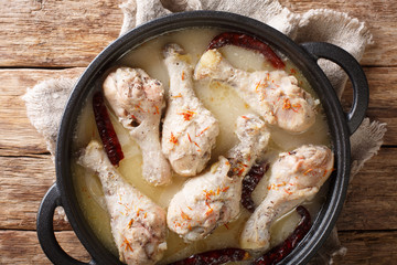 White chicken curry served in a pan. Country style. Horizontal top view