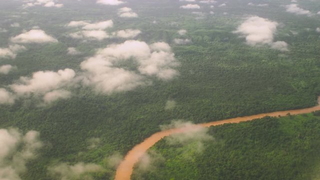 Flying Over Impassable Jungles of Borneo Island near Mulu River in Gunung Mulu National Park, Sarawak Province, Malaysia