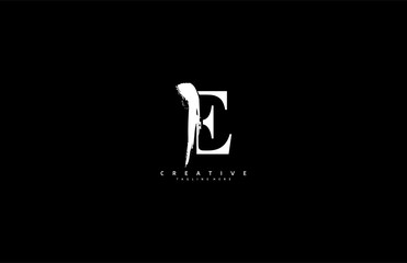 Grunge E logo urban monogram script