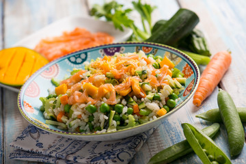 rice salad with smoked salmon mango and mixed vegetables