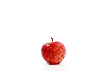 Red ripe fresh apple on white background.
