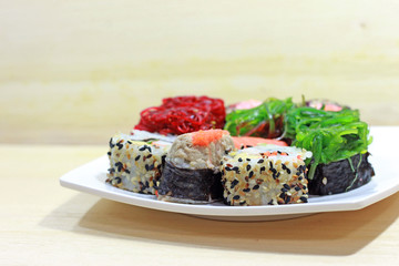 Mixed Sushi on wood table, Side view and Selective focus.