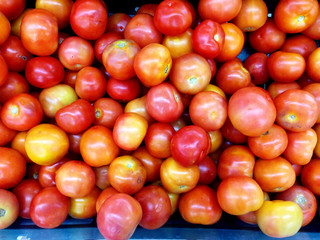Fresh tomatoes background.