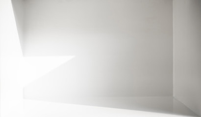 The scene in a white room with empty space and refraction of light and shadow