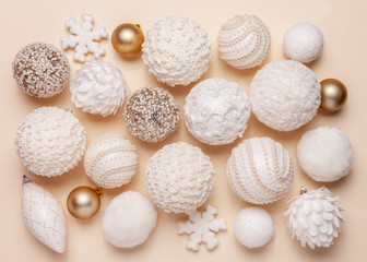 Christmas background made of christmas ornaments on beige background. Top view, flat lay