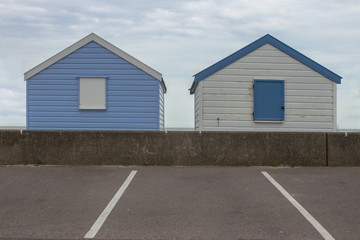 Row beach huts, rental cabins and parking lot, iverted colors