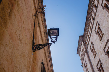 architecture, street, old, building, city, house, europe, town, italy, ancient, wall, church, travel, spain, medieval, stone, tower, historic, tourism, narrow, sky, lamp