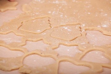 hands that make Christmas cookies, from dough and ready to bake