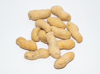 Peanuts with shell( Arachis hypogaea) on white background.